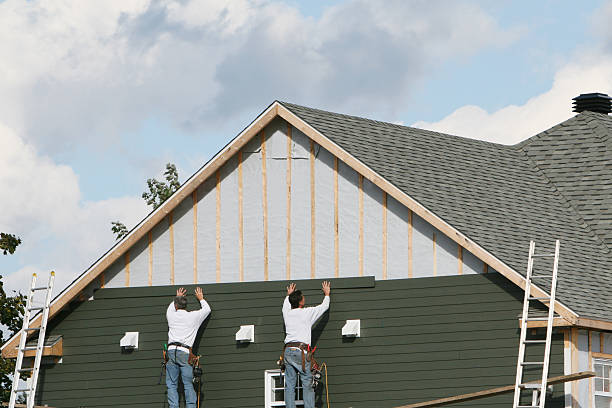 Professional Siding technician working in Masury, OH